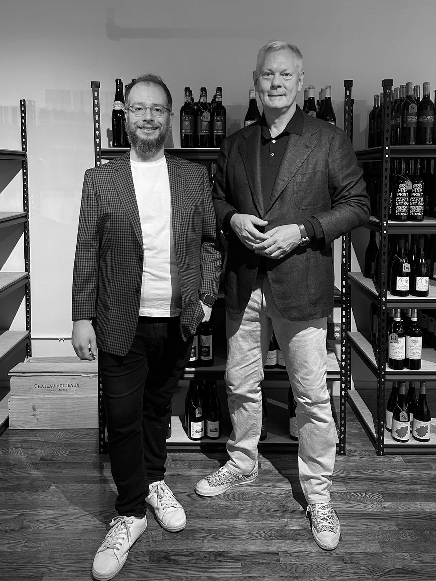 The owners of Pure Wine standing in the shop
