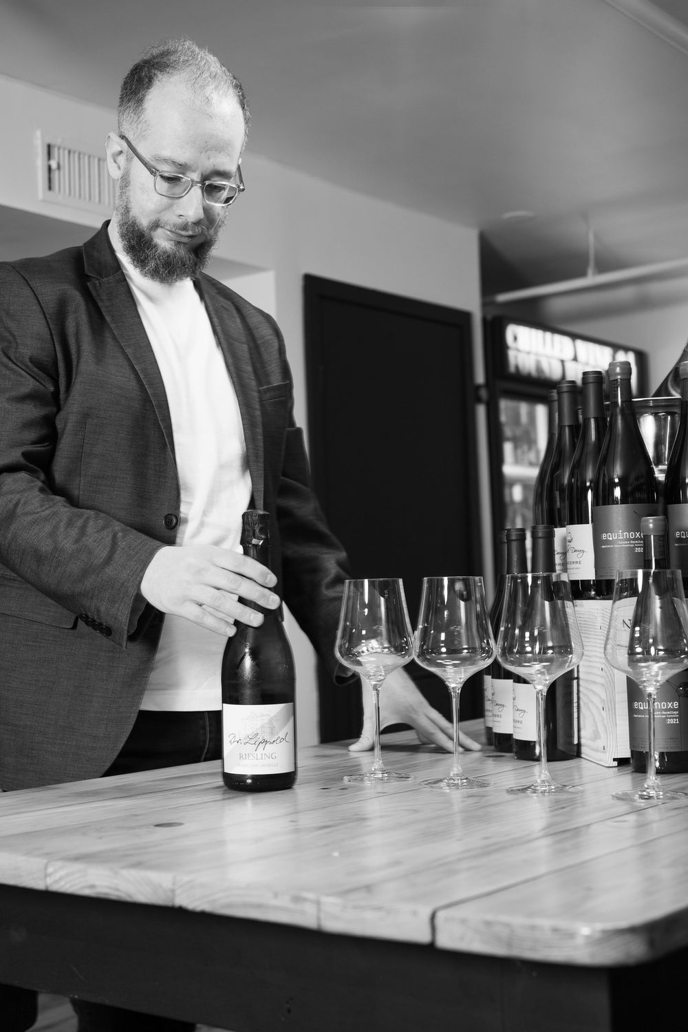 A sommelier setting up a private class at Pure Wine